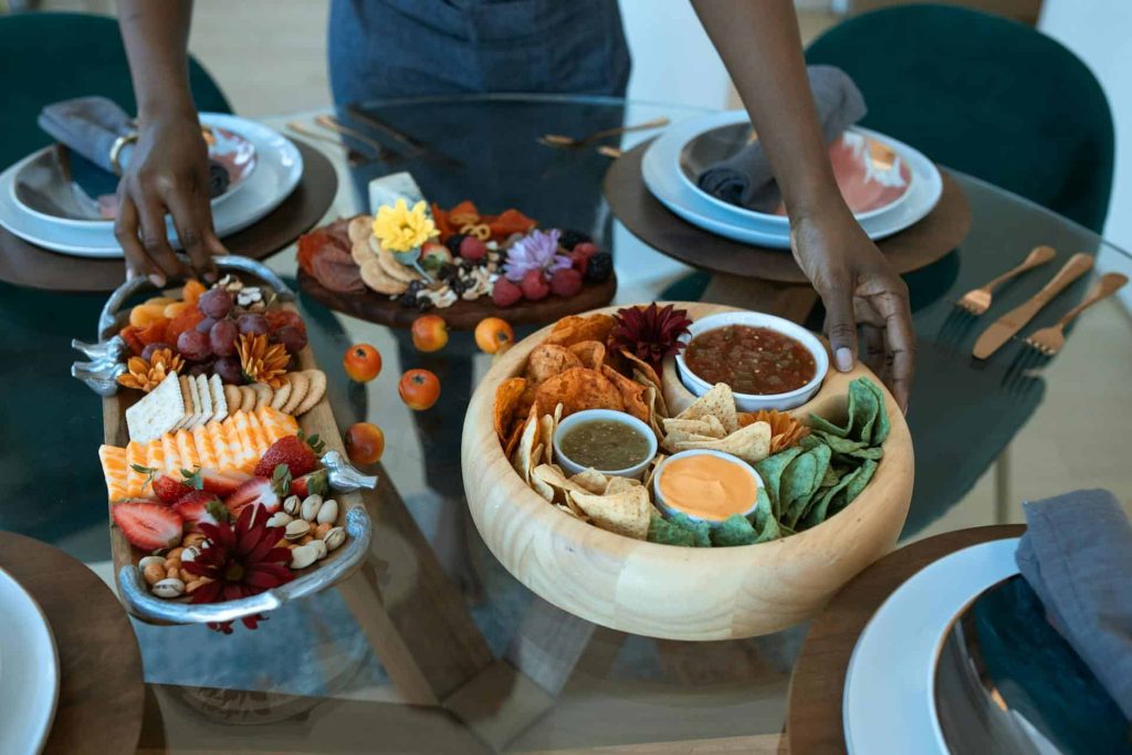 party appetizer dips with variety fruits and crackers